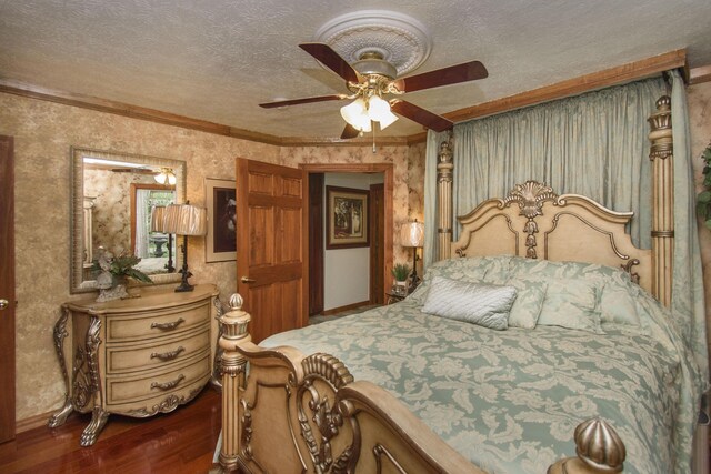 157 Burks Hollow Rd SW, Willis, VA 24380 - bedroom featuring dark wood-style floors, ornamental molding, a textured ceiling, and ceiling fan