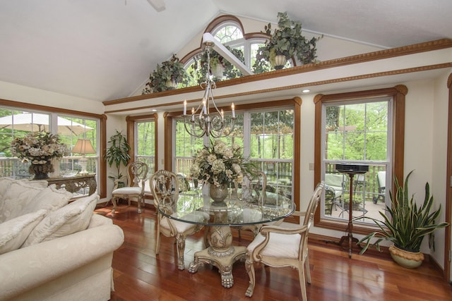 157 Burks Hollow Rd SW, Willis, VA 24380 - dining area with a chandelier, vaulted ceiling, wood finished floors, and healthy amount of natural light