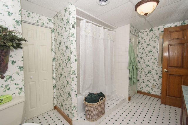 157 Burks Hollow Rd SW, Willis, VA 24380 - bathroom with wallpapered walls, baseboards, toilet, and shower / tub combo