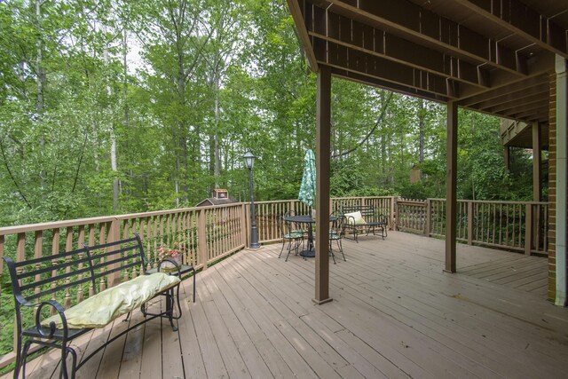 157 Burks Hollow Rd SW, Willis, VA 24380 - wooden terrace with outdoor dining space