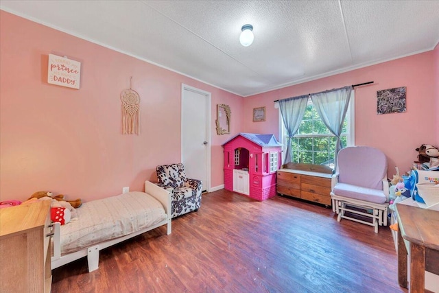 4362 Stewartsville Rd, Moneta, VA 24121 - bedroom featuring ornamental molding, wood finished floors, and a textured ceiling