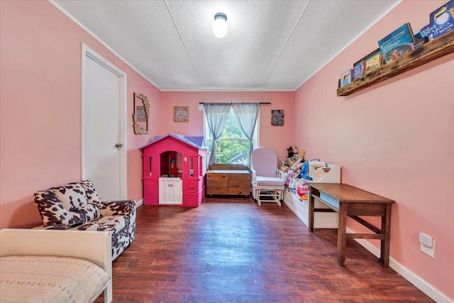 4362 Stewartsville Rd, Moneta, VA 24121 - sitting room with wood finished floors, crown molding, a textured ceiling, and baseboards