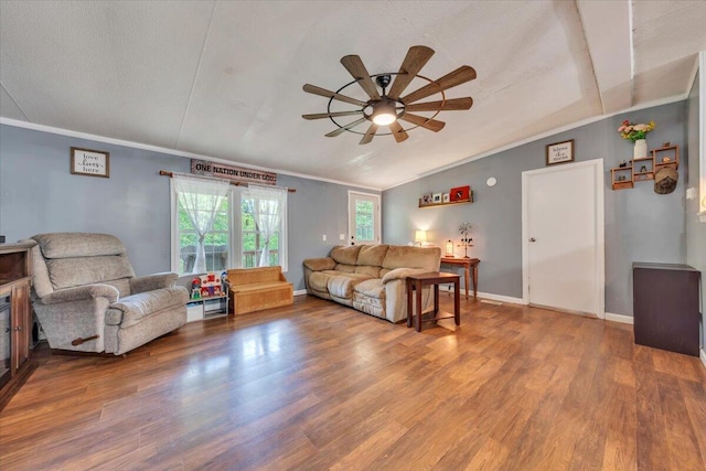 4362 Stewartsville Rd, Moneta, VA 24121 - living room with a ceiling fan, wood finished floors, crown molding, lofted ceiling, and baseboards
