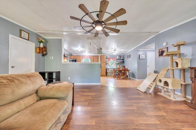 4362 Stewartsville Rd, Moneta, VA 24121 - living room with wood finished floors, a ceiling fan, and baseboards