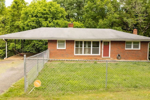 212 Woodland Rd, Bassett, VA 24055 - ranch-style home with a chimney, brick siding, asphalt driveway, and a carport