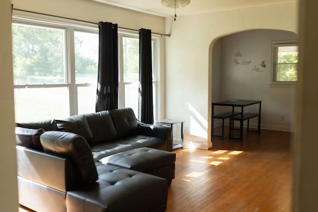 212 Woodland Rd, Bassett, VA 24055 - living area featuring arched walkways, wood-type flooring, and baseboards