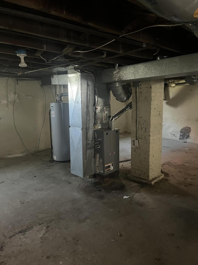 2816 10th St NW, Roanoke, VA 24012 - unfinished below grade area with gas water heater and heating unit