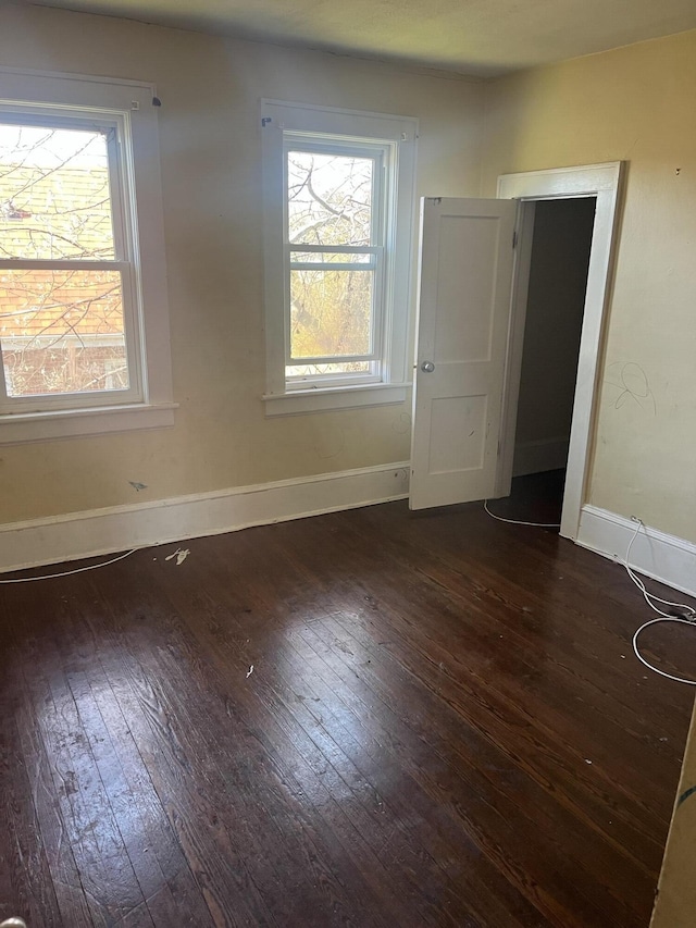 2816 10th St NW, Roanoke, VA 24012 - empty room with wood-type flooring and baseboards
