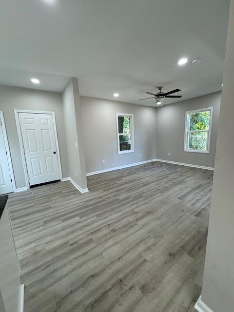 2207 Melrose Ave NW, Roanoke, VA 24017 - empty room with baseboards, ceiling fan, wood finished floors, and recessed lighting