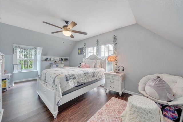 1028 Park Mountain Ter, Huddleston, VA 24104 - bedroom with vaulted ceiling, dark wood-type flooring, multiple windows, baseboards, and a ceiling fan