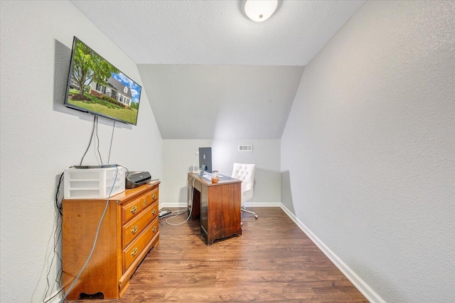 1028 Park Mountain Ter, Huddleston, VA 24104 - office area with wood finished floors, lofted ceiling, and baseboards