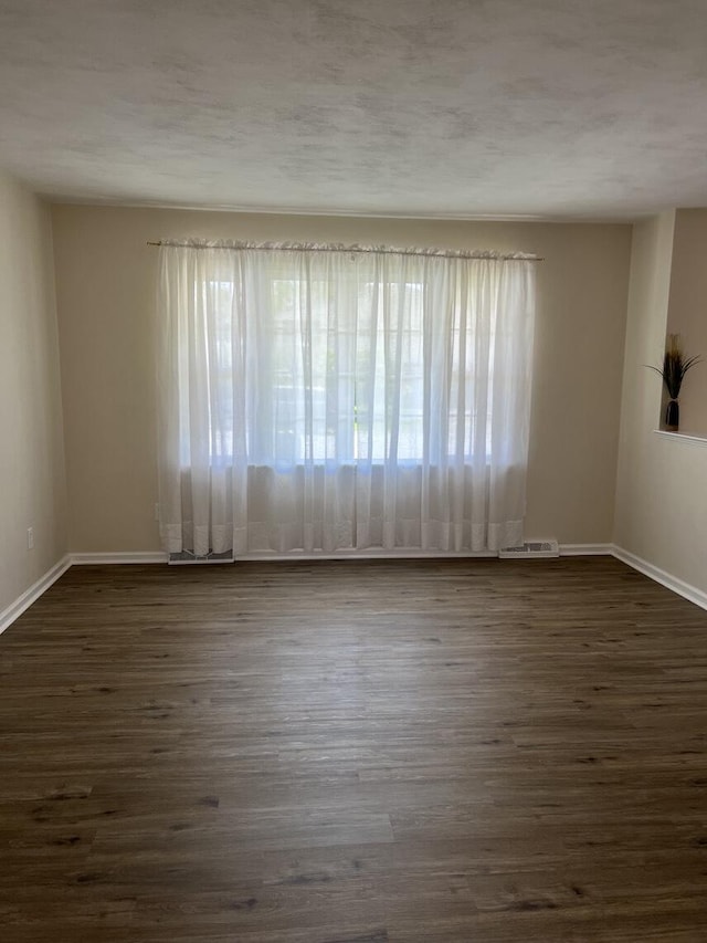 1878 Cranwell Dr, Vinton, VA 24179 - unfurnished room featuring dark wood-style floors and baseboards