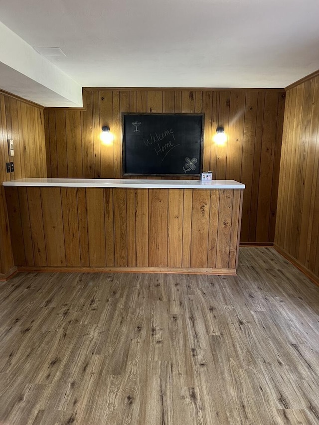 1878 Cranwell Dr, Vinton, VA 24179 - unfurnished living room with wood finished floors and wooden walls