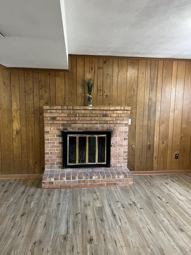1878 Cranwell Dr, Vinton, VA 24179 - detailed view of wooden walls, a fireplace, wood finished floors, and baseboards