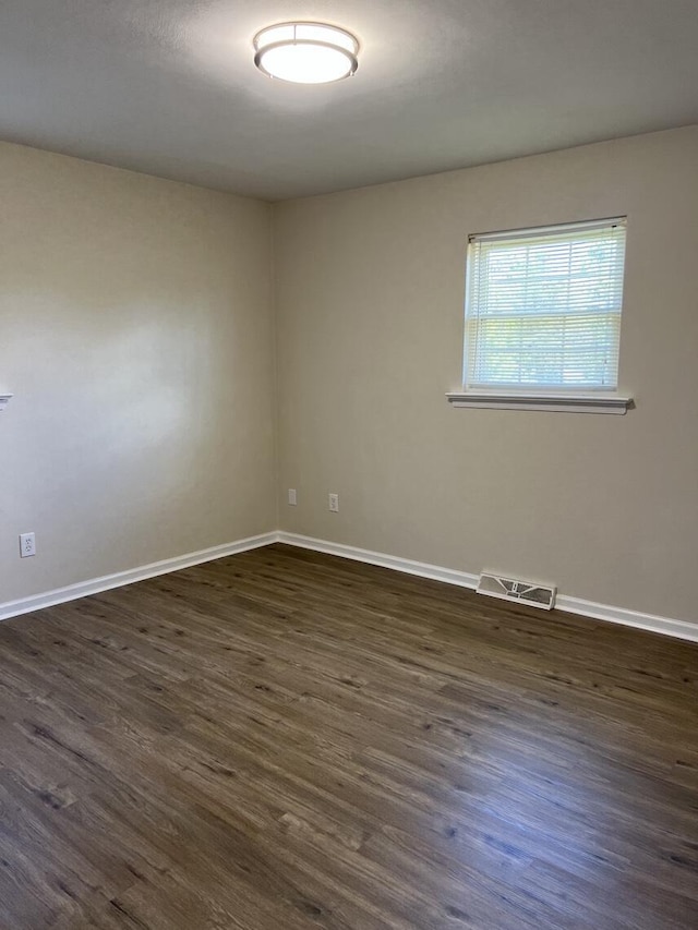 1878 Cranwell Dr, Vinton, VA 24179 - empty room featuring dark wood-type flooring and baseboards