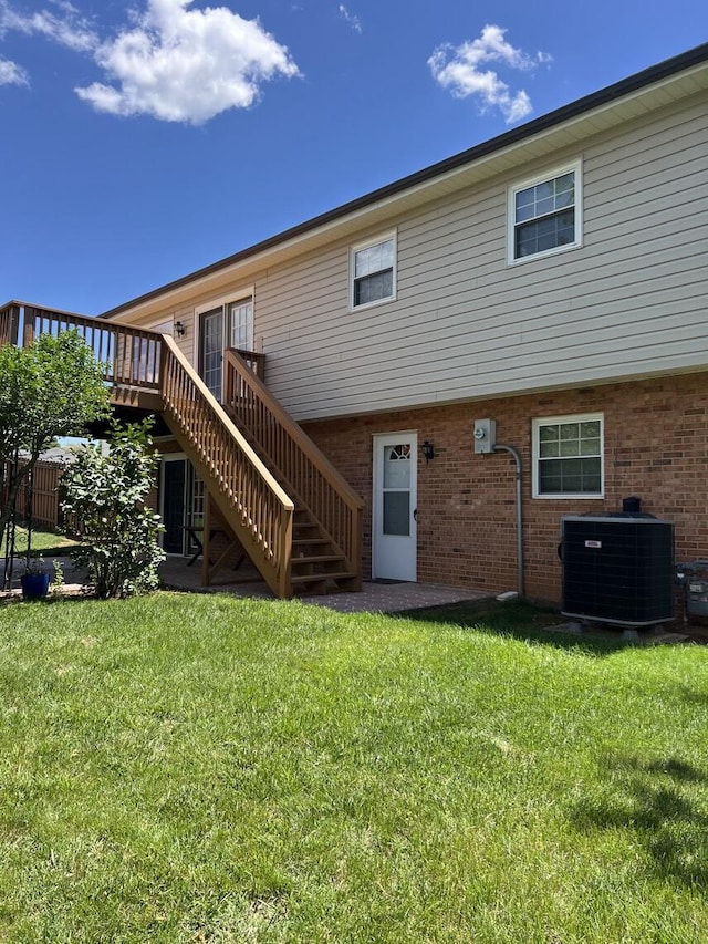 1878 Cranwell Dr, Vinton, VA 24179 - back of house with central air condition unit, stairway, a deck, and brick siding