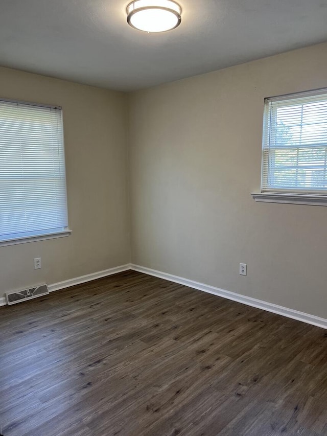1878 Cranwell Dr, Vinton, VA 24179 - empty room with dark wood-style floors and baseboards