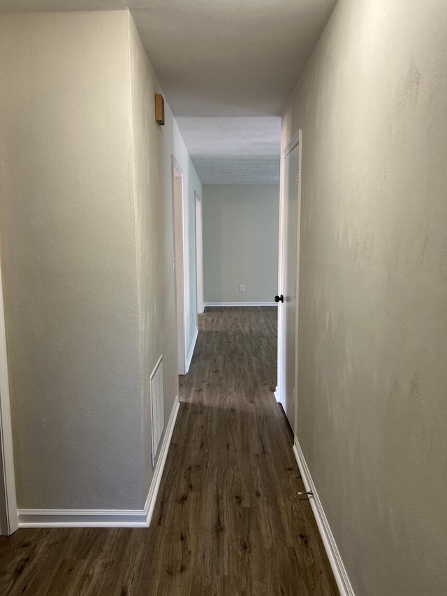 1878 Cranwell Dr, Vinton, VA 24179 - hallway featuring dark wood-type flooring and baseboards