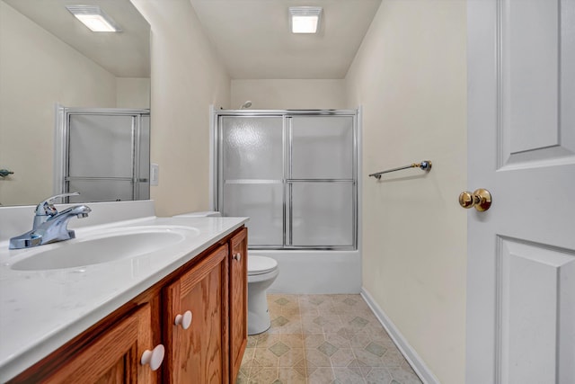 1801 Meadows Ct, Vinton, VA 24179 - bathroom featuring vanity, toilet, bath / shower combo with glass door, and baseboards