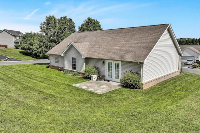 1801 Meadows Ct, Vinton, VA 24179 - back of house with a shingled roof, a yard, and a patio area