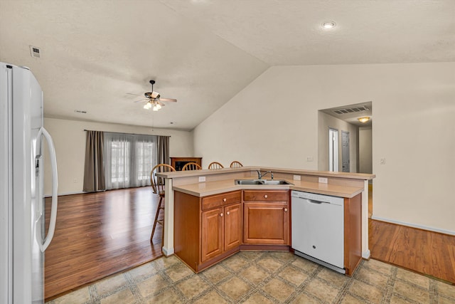 1801 Meadows Ct, Vinton, VA 24179 - kitchen featuring white appliances, a ceiling fan, open floor plan, a kitchen island with sink, and vaulted ceiling