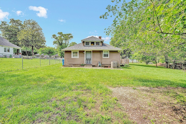 1514 Redwood Rd SE, Roanoke, VA 24014 - back of house featuring a chimney, a shingled roof, and central AC