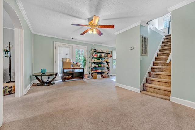 1514 Redwood Rd SE, Roanoke, VA 24014 - sitting room with ceiling fan, baseboards, stairway, ornamental molding, and a textured ceiling