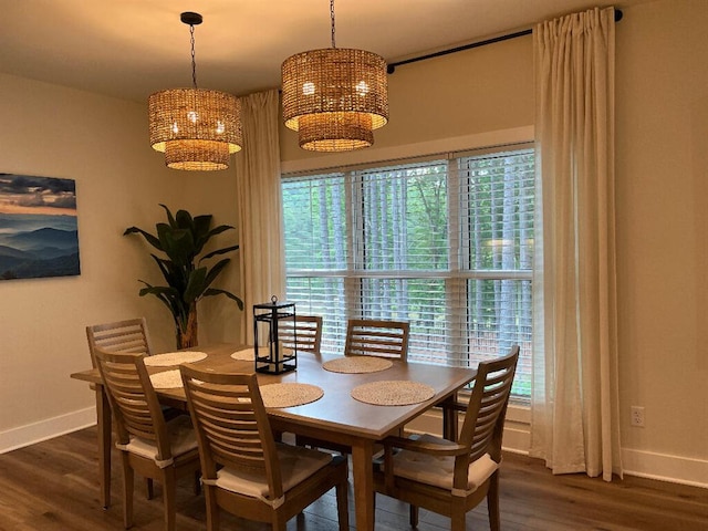 844 Lakewatch Cir, Moneta, VA 24121 - dining space featuring baseboards, a chandelier, and dark wood-style flooring