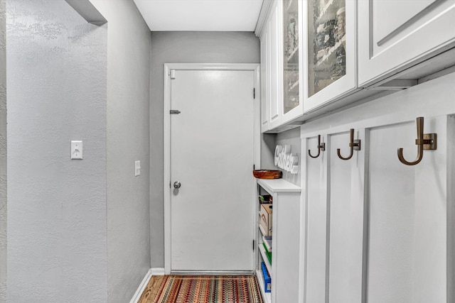 2440 Charing Cross Dr, Roanoke, VA 24018 - mudroom with a textured wall and baseboards