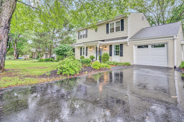 2440 Charing Cross Dr, Roanoke, VA 24018 - view of front of home featuring brick siding, driveway, a garage, a front lawn, and roof with shingles