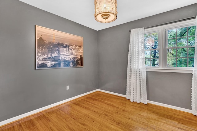 2440 Charing Cross Dr, Roanoke, VA 24018 - spare room featuring baseboards and wood finished floors