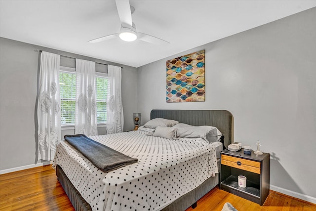 2440 Charing Cross Dr, Roanoke, VA 24018 - bedroom featuring baseboards, wood finished floors, and a ceiling fan