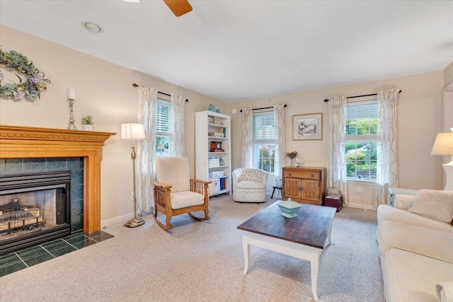 610 Crystal Anne Ln, Roanoke, VA 24019 - living area featuring a fireplace, carpet floors, baseboards, and a ceiling fan