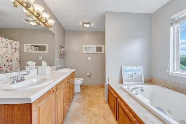 610 Crystal Anne Ln, Roanoke, VA 24019 - bathroom featuring double vanity, toilet, healthy amount of natural light, and a whirlpool tub