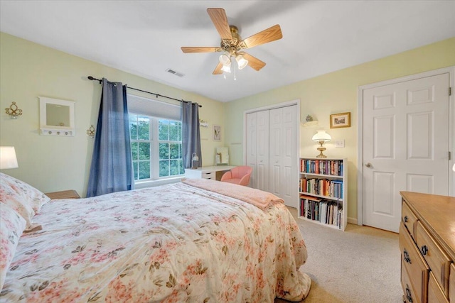 610 Crystal Anne Ln, Roanoke, VA 24019 - bedroom featuring light carpet, a closet, a ceiling fan, and baseboards