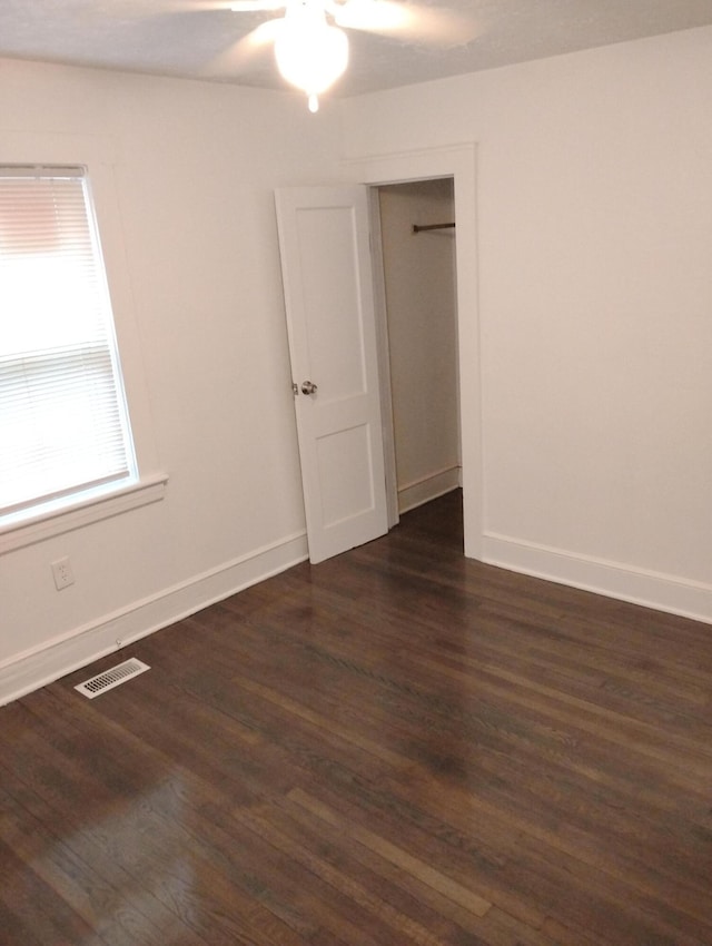 1414 Westside Blvd NW, Roanoke, VA 24017 - empty room with ceiling fan, dark wood-type flooring, and baseboards