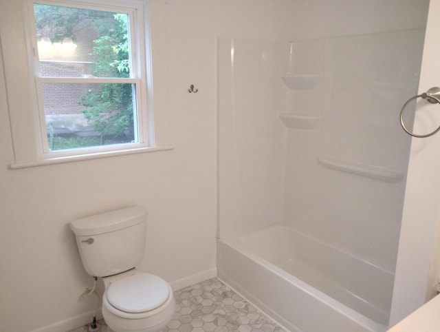 1414 Westside Blvd NW, Roanoke, VA 24017 - bathroom with baseboards, toilet,  shower combination, and tile patterned floors
