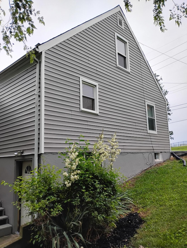 1414 Westside Blvd NW, Roanoke, VA 24017 - view of property exterior with a lawn