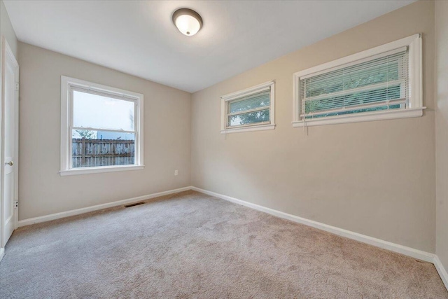 3023 Birchlawn Ave NW, Roanoke, VA 24012 - carpeted spare room featuring baseboards