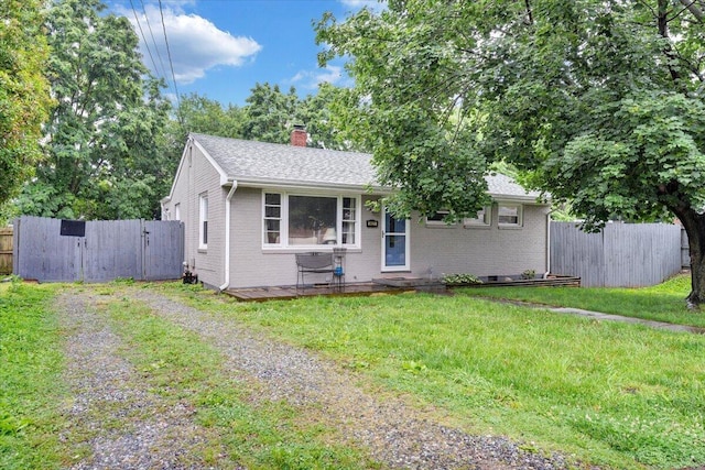 3023 Birchlawn Ave NW, Roanoke, VA 24012 - view of front of home with brick siding, driveway, a gate, a chimney, and a shingled roof