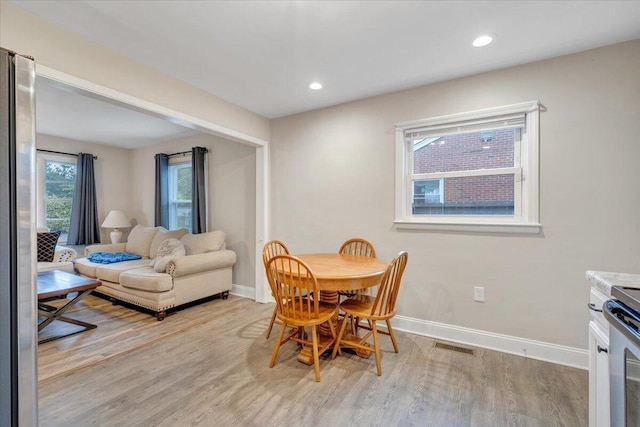 3023 Birchlawn Ave NW, Roanoke, VA 24012 - dining area with light wood-style floors, baseboards, and recessed lighting