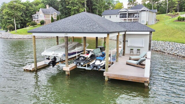 1115 Oakshire Ln, Wirtz, VA 24184 - dock area with boat lift, a water view, a yard, and view of scattered trees