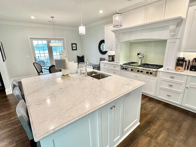 1115 Oakshire Ln, Wirtz, VA 24184 - kitchen featuring stainless steel gas cooktop, a sink, a center island with sink, tasteful backsplash, and dark wood-style floors