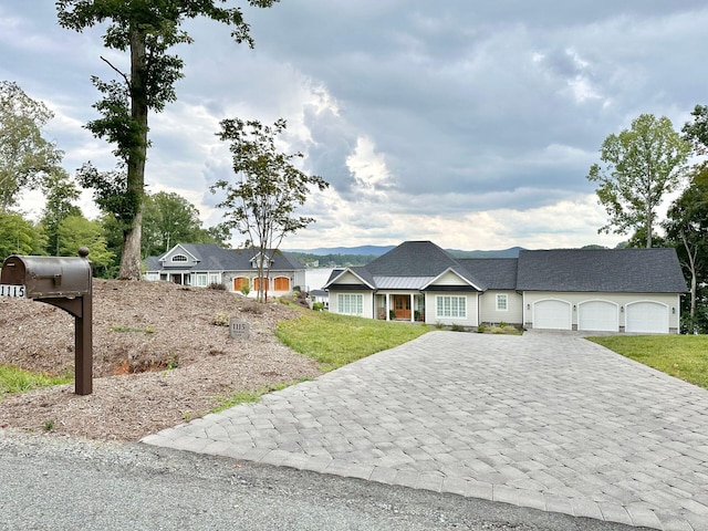 1115 Oakshire Ln, Wirtz, VA 24184 - single story home with decorative driveway, a garage, and a front lawn