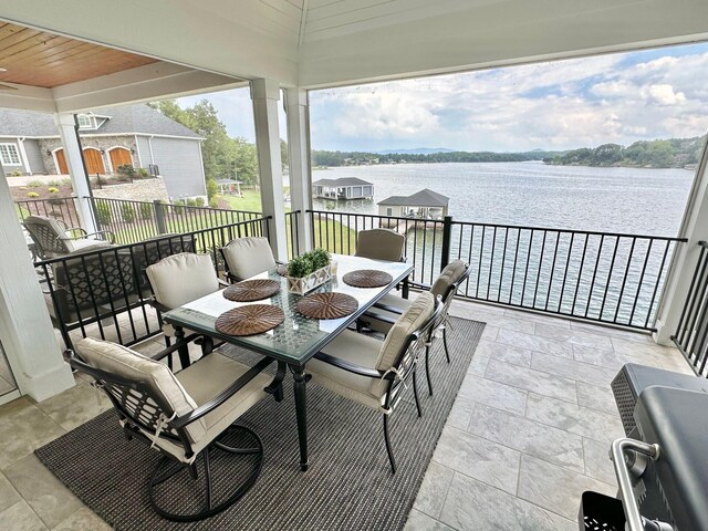 1115 Oakshire Ln, Wirtz, VA 24184 - view of patio / terrace featuring a water view and outdoor dining area