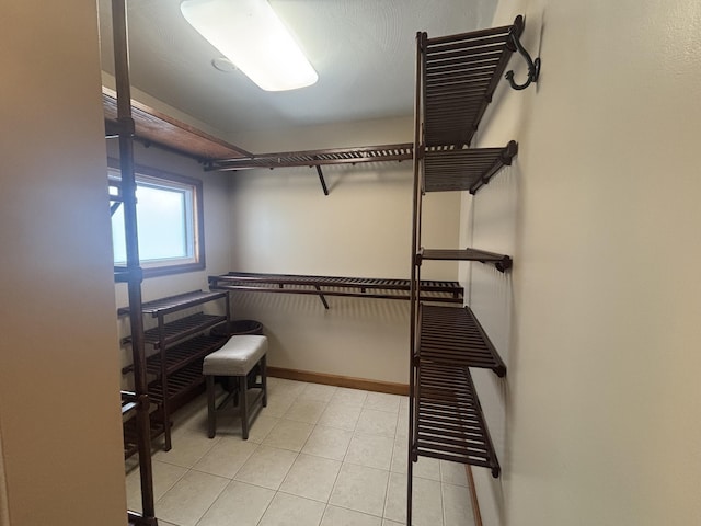 120 Nyle Ridge Rd, Wirtz, VA 24184 - walk in closet featuring light tile patterned floors