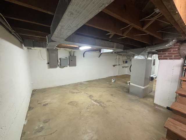 120 Nyle Ridge Rd, Wirtz, VA 24184 - unfinished basement featuring electric panel and heating unit
