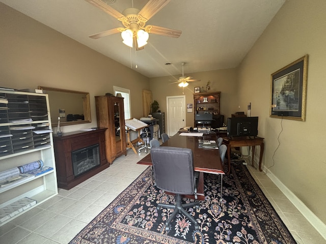 120 Nyle Ridge Rd, Wirtz, VA 24184 - dining area with light tile patterned floors, ceiling fan, a glass covered fireplace, and a desk