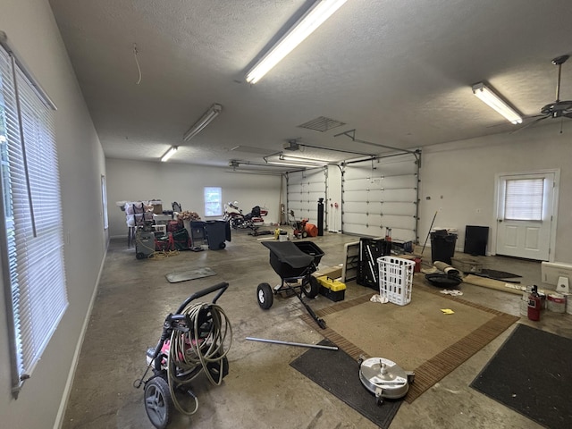 120 Nyle Ridge Rd, Wirtz, VA 24184 - garage featuring a garage door opener and ceiling fan
