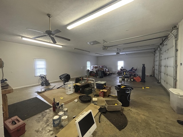 120 Nyle Ridge Rd, Wirtz, VA 24184 - garage with ceiling fan and baseboards